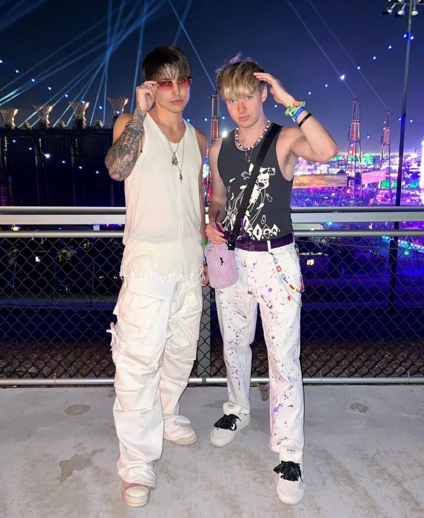 Sam and Colby together snaps a photo.